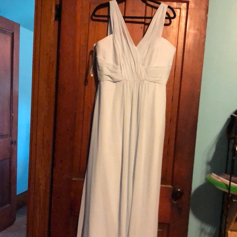 bridesmaid dress has several flaws price reflects size 18. Have been tailored